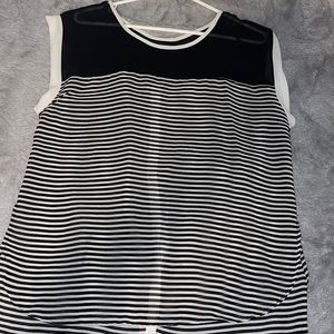 SLEEVELESS HIGH-LOW BLOUSE